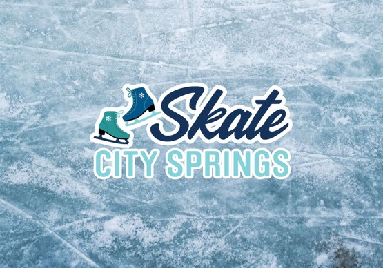 Skate City Springs logo on top of ice of a skating rink