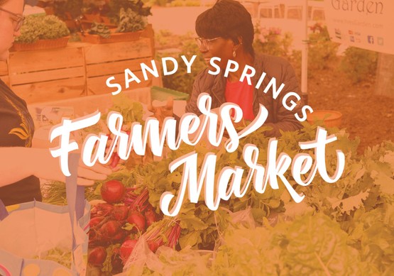 Farmers Market emblem in front produce