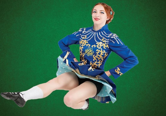 Young lady in Celtic costume demonstrating Irish dancing