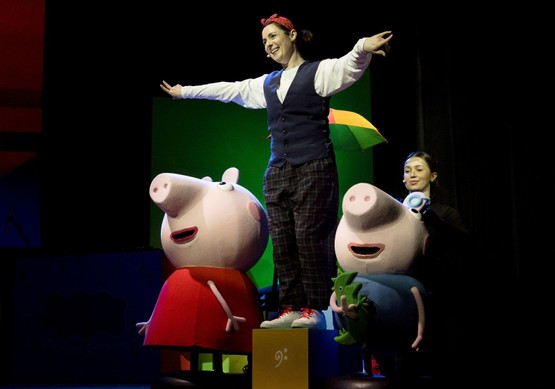 Peppa and George Pig learn some new music in a live stage show