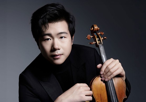 Johns Creek Symphony Orchestra soloist Simon Zhu with his violin